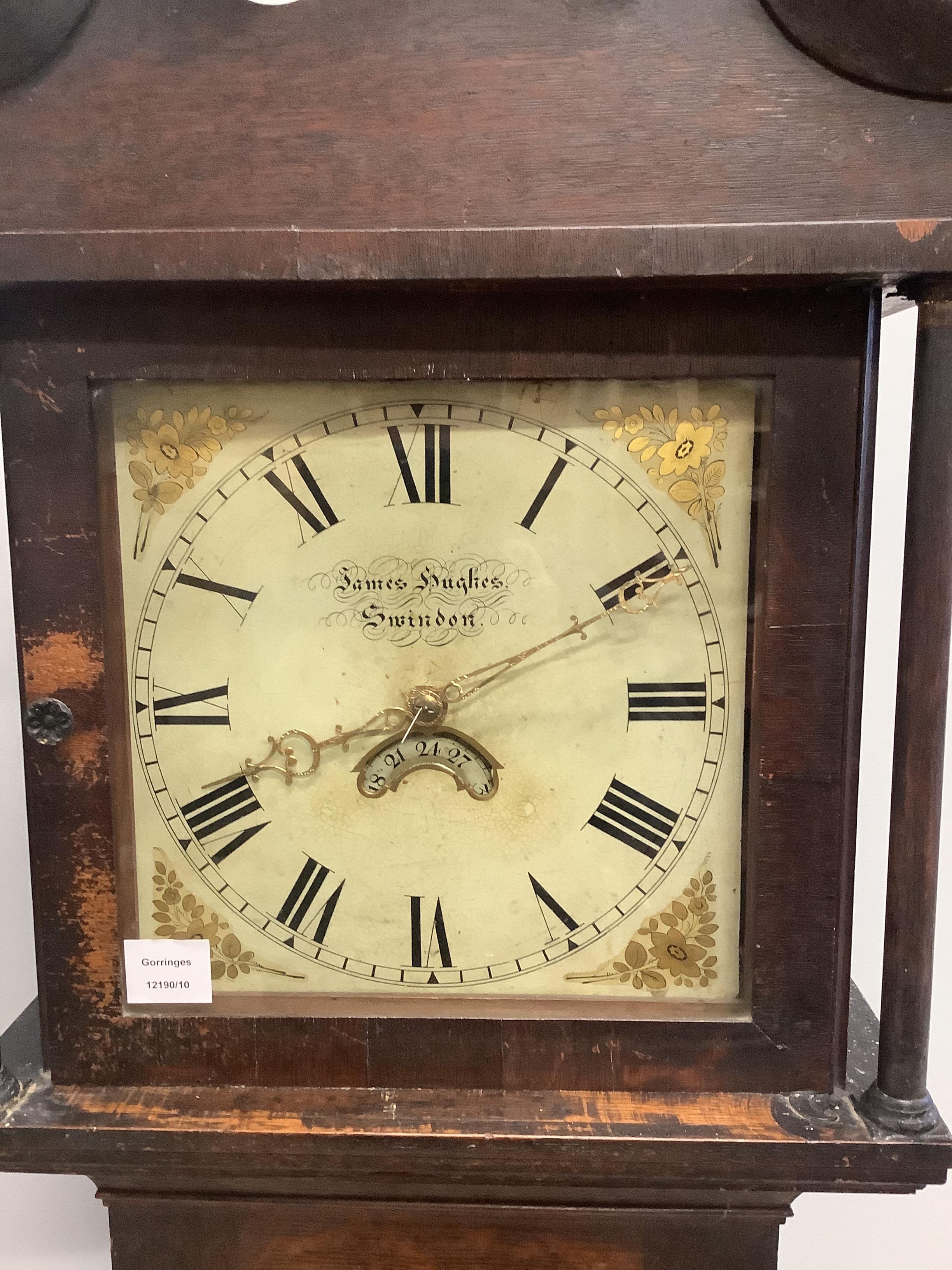 An early 19th century oak thirty hour longcase clock marked James Hughes, Swindon, height 191cm
